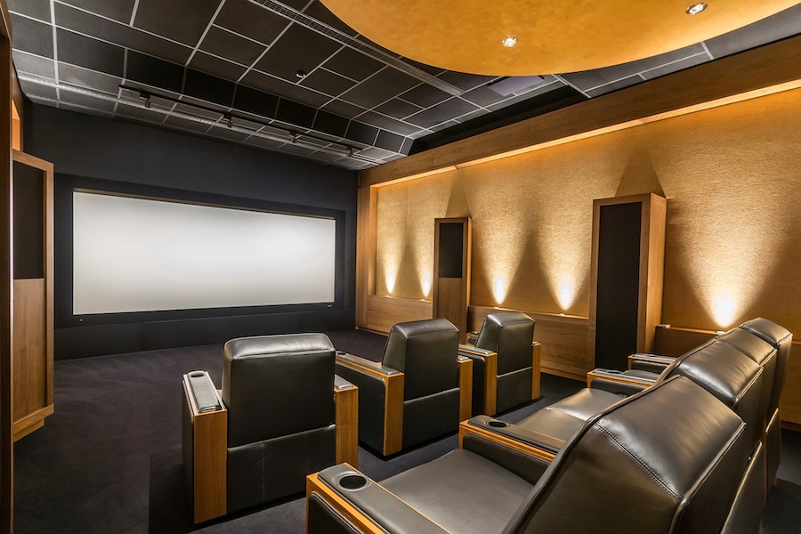 A luxury home theater with state-of-the-art equipment.